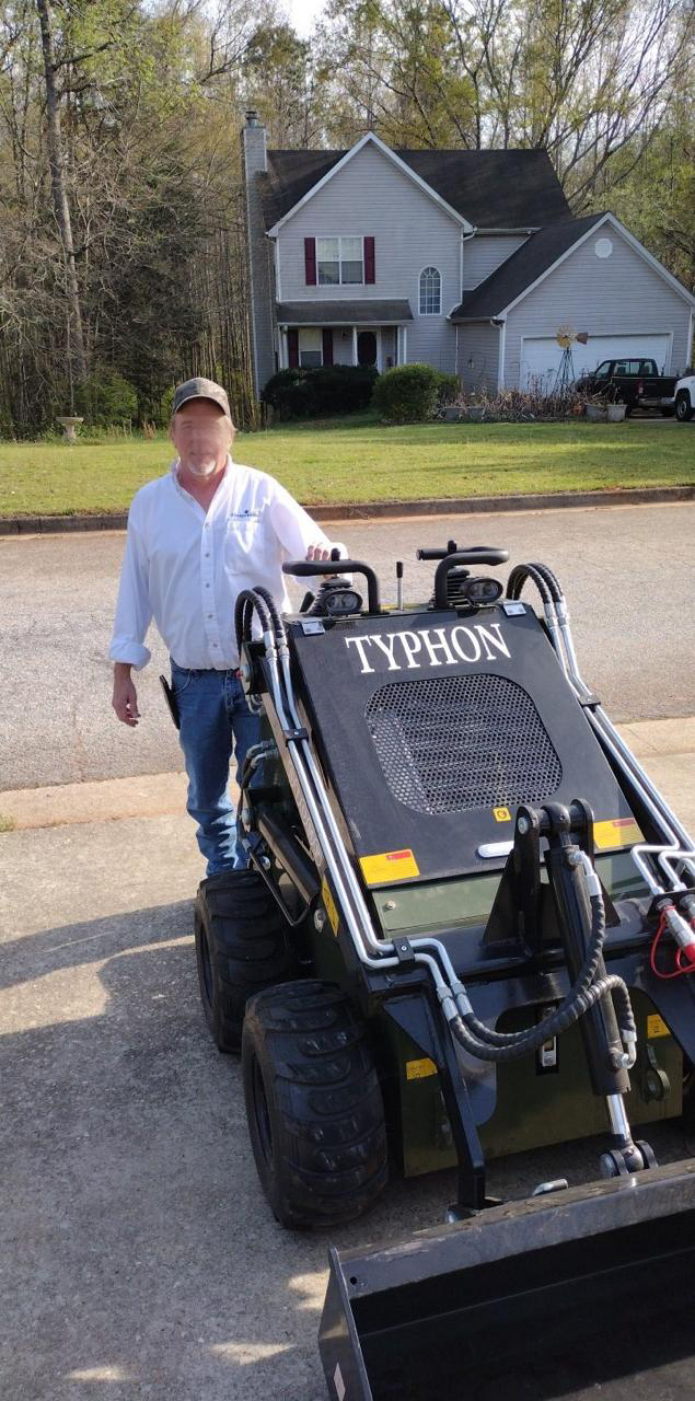 Compact skid steer customer pickup photo